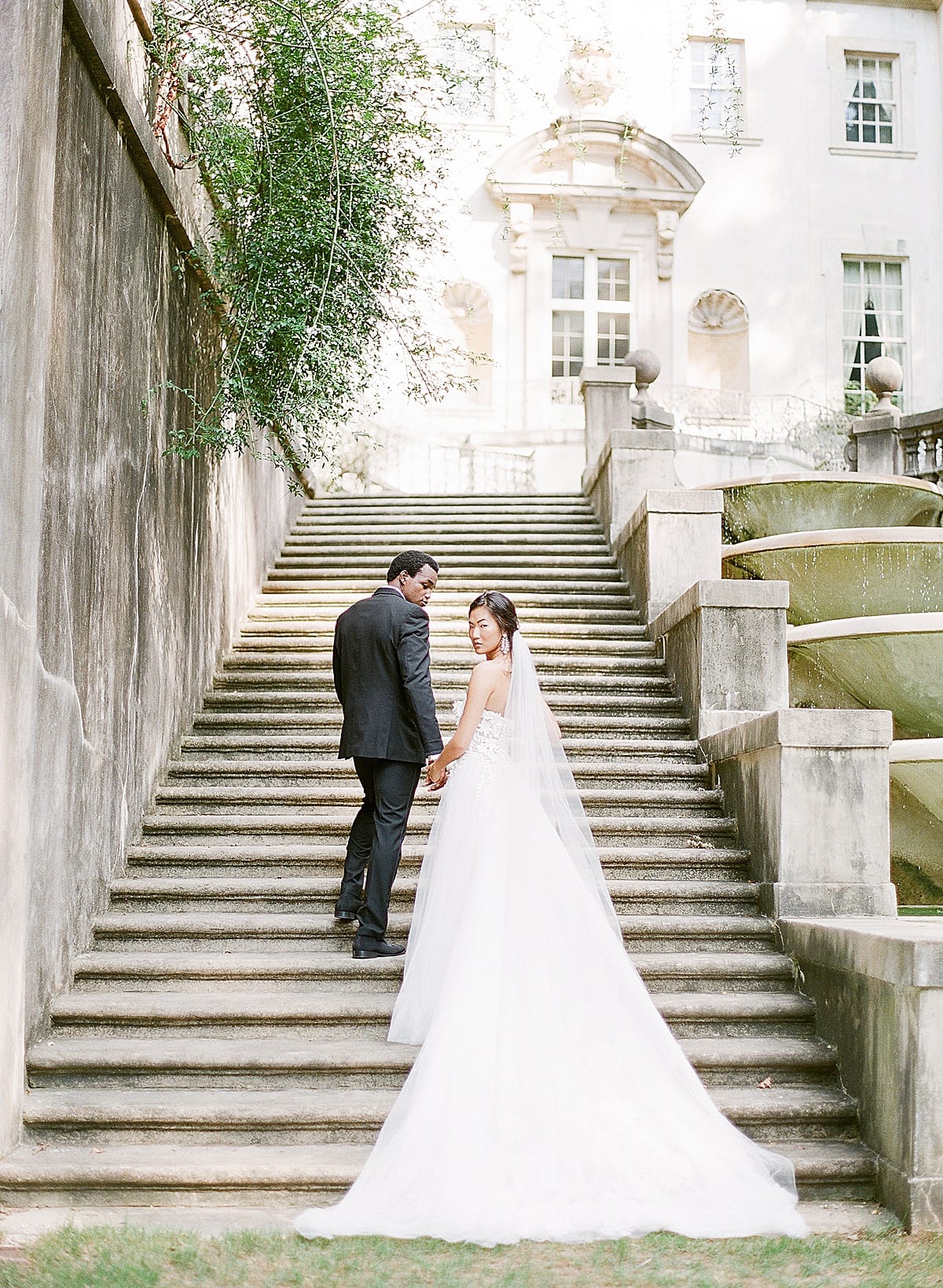 The Swan House Wedding Venue Bride and Groom on Stairs Photo 