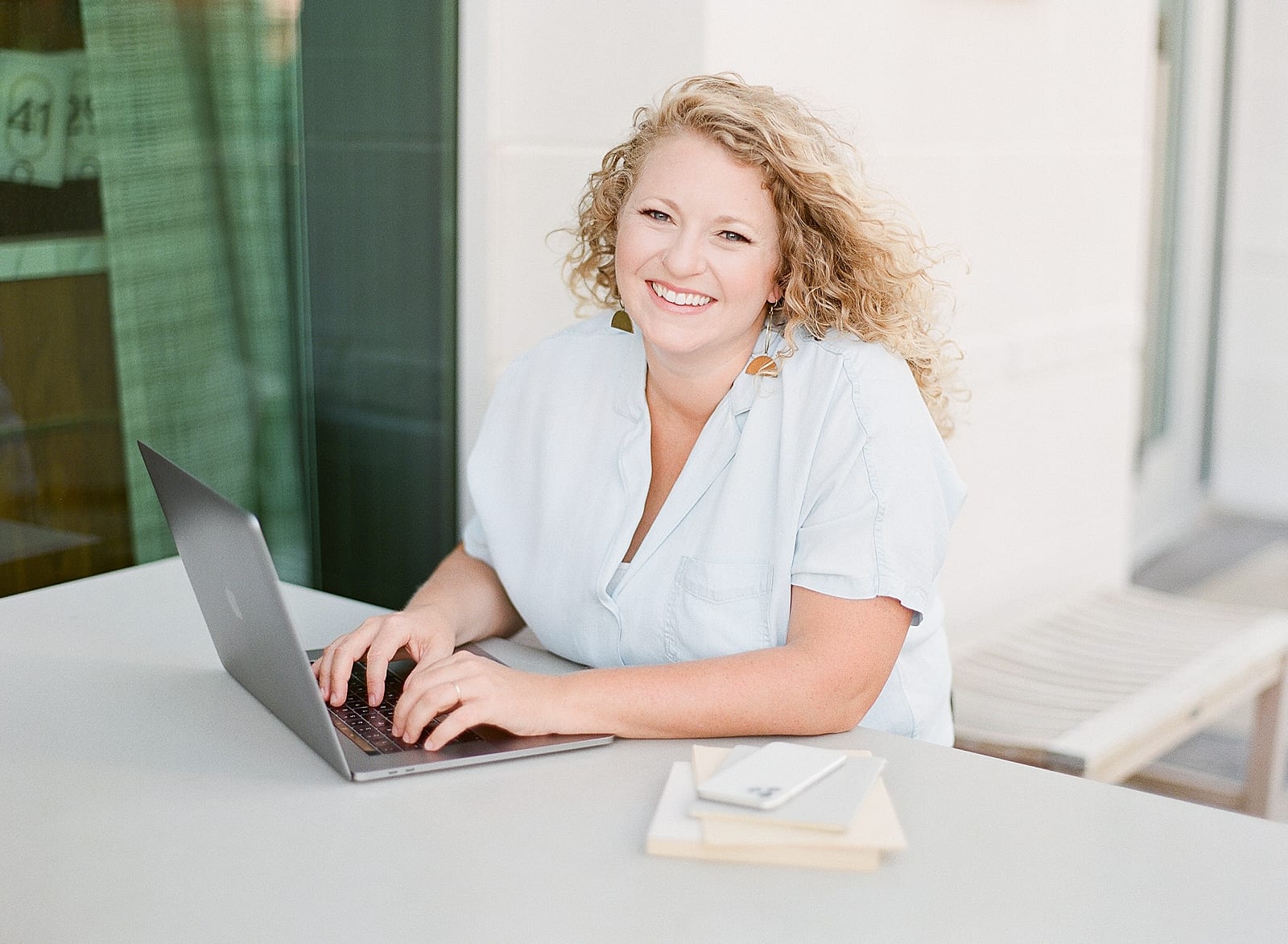 Branding Photography Woman Typing on Computer Smiling Photo