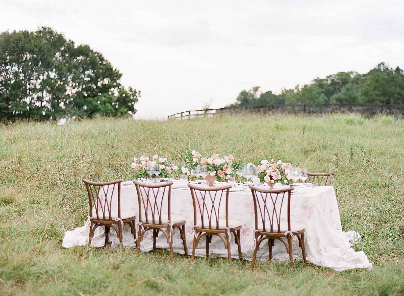 Wedding Reception Table in Field at Inn at Serenbe Photo