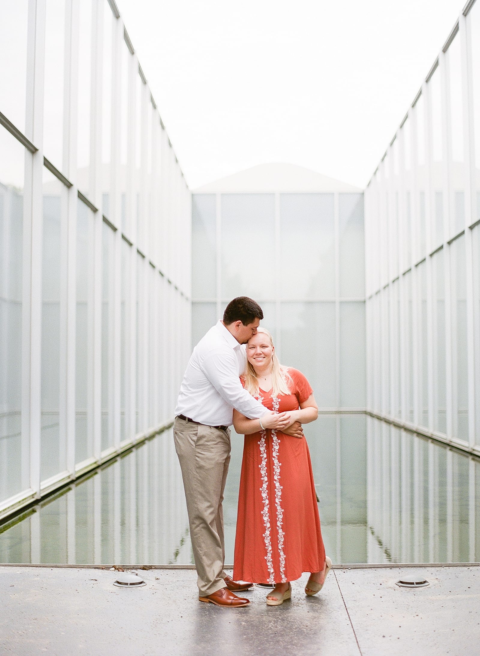 NC Museum of Art Engagement Session Couple Snuggling Photo