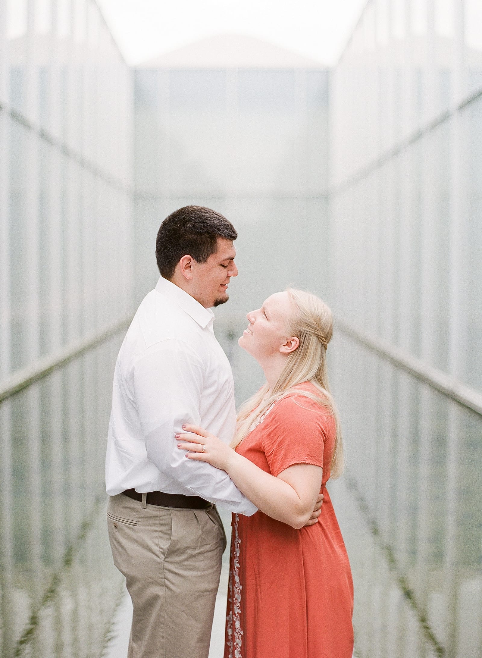 NC Museum of Art Engagement Session Couple Looking at Each Other Photo