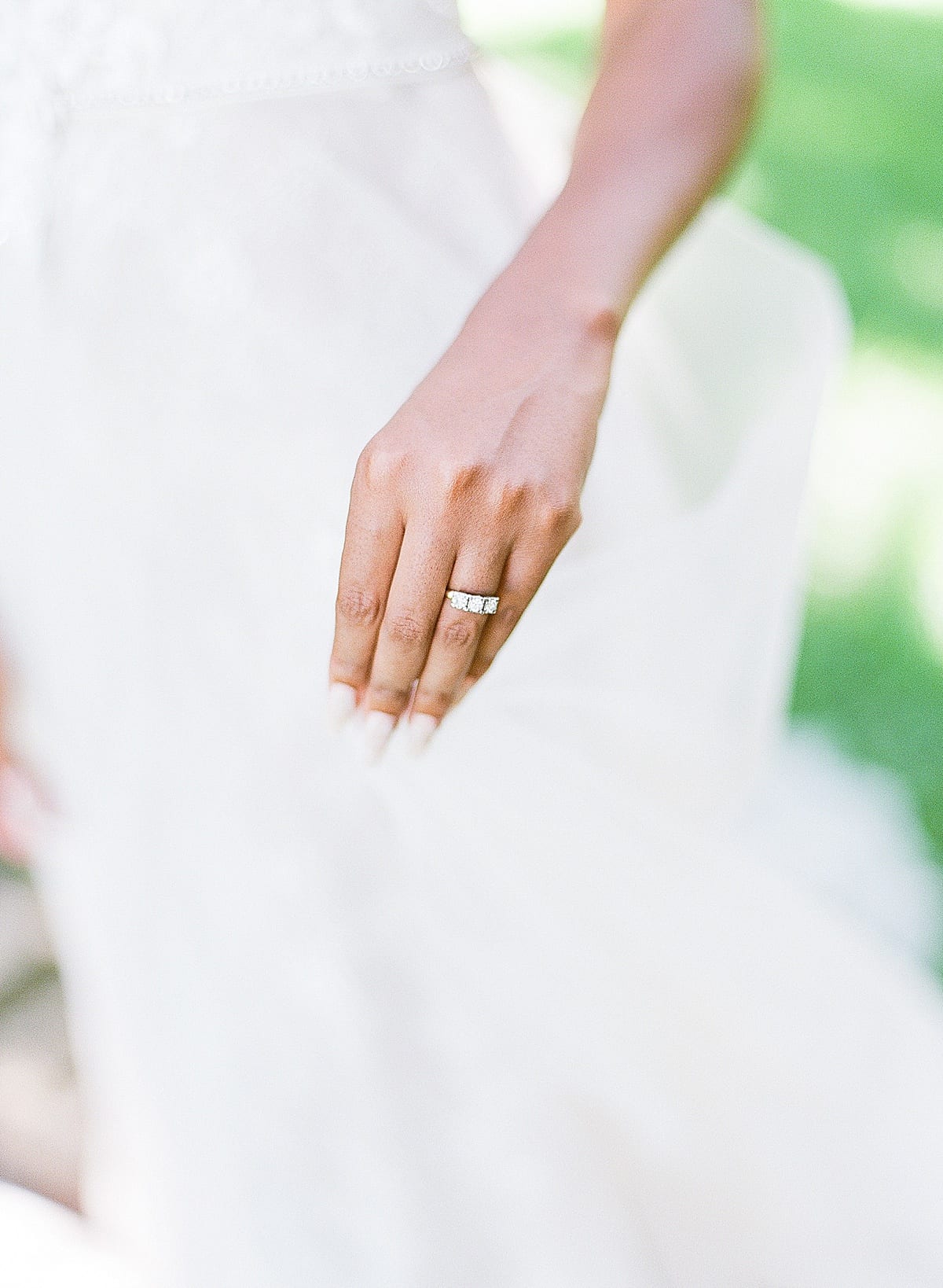 Wedding Ring Hand Holding Wedding Gown Photo 