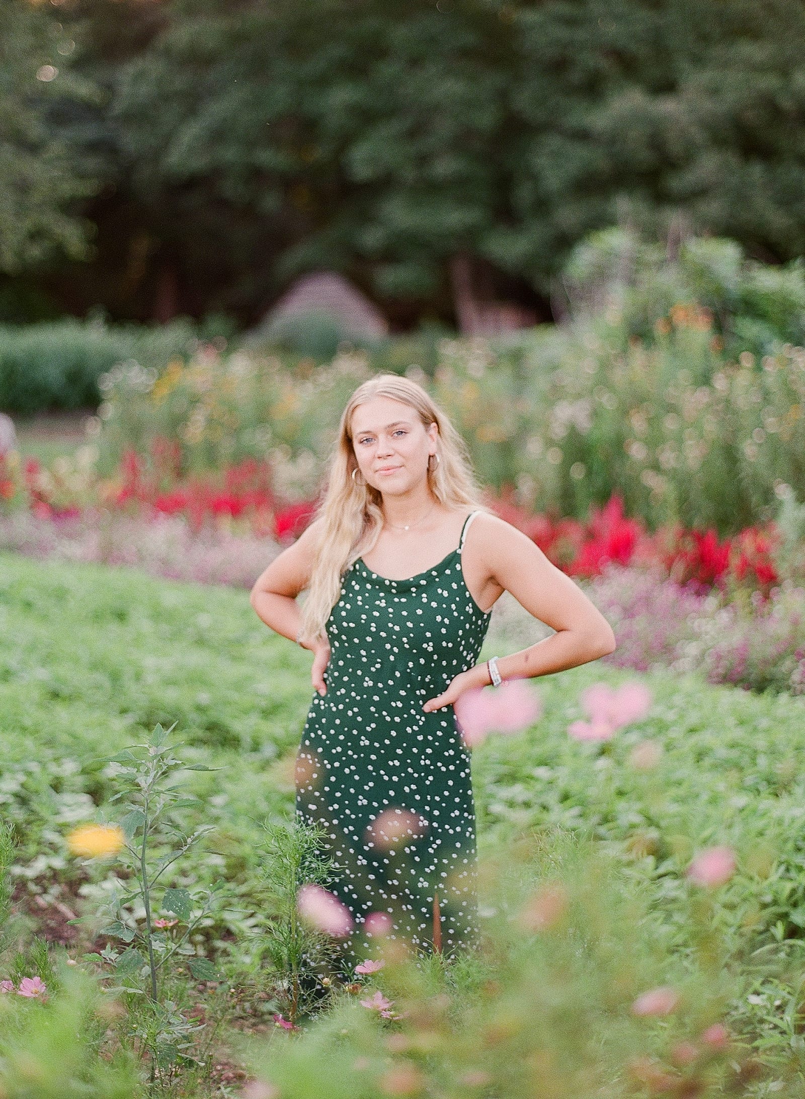 Top Tips For The Best Senior Photos Girl in Garden with hands on hips photo