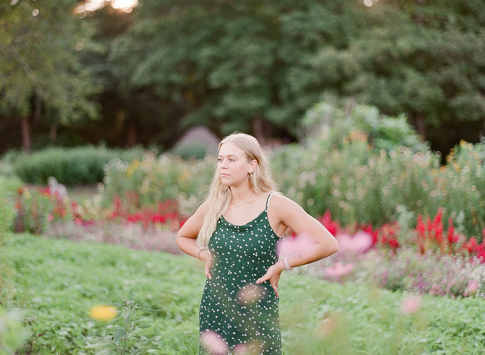 Top Tips For The Best Senior Photos Girl in Garden with Hands on Hips Photo