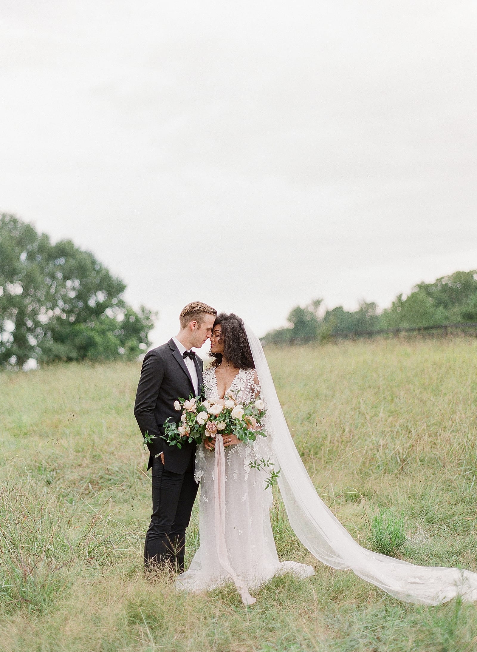 Bride and Groom Nose to Nose in Field at Serenbe GA Photo