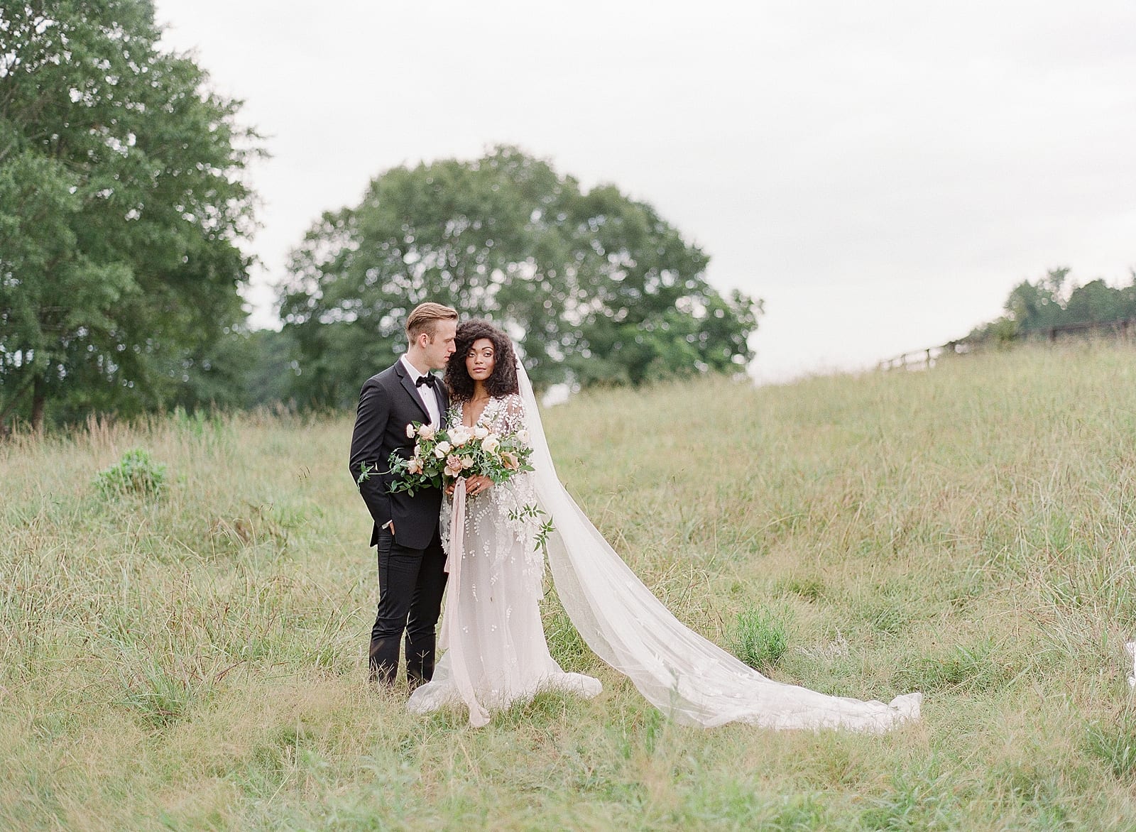 Bride and Groom in Field at Serenbe GA Photo