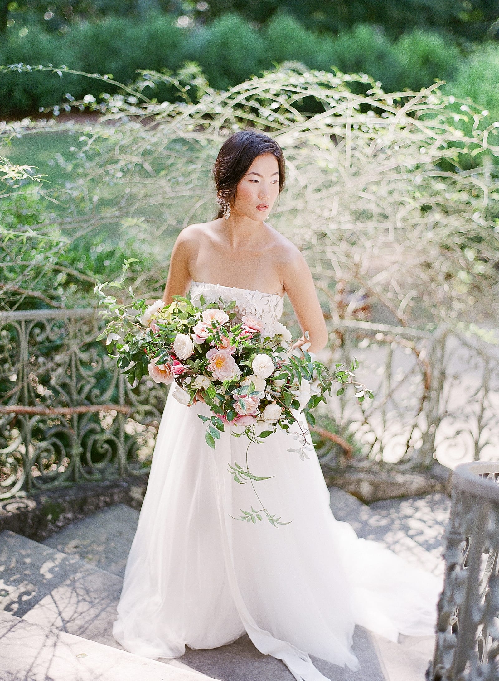 Bride Holding Bouquet on Back steps at Swan House Atlanta Photo