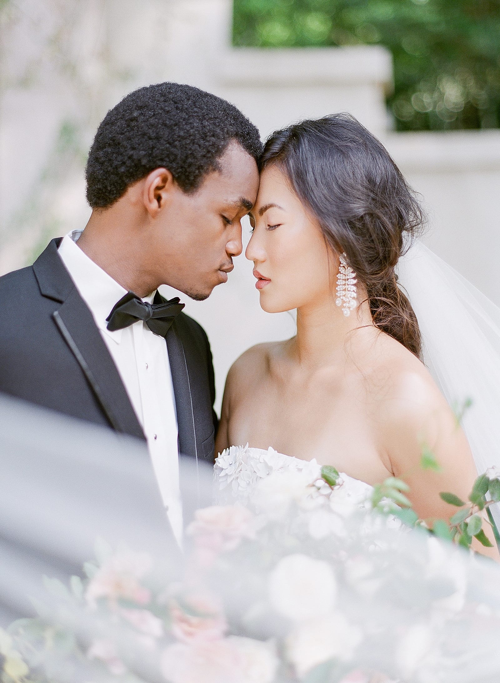Bride and Groom Snuggling Nose to Nose at Swan House Atlanta Photo