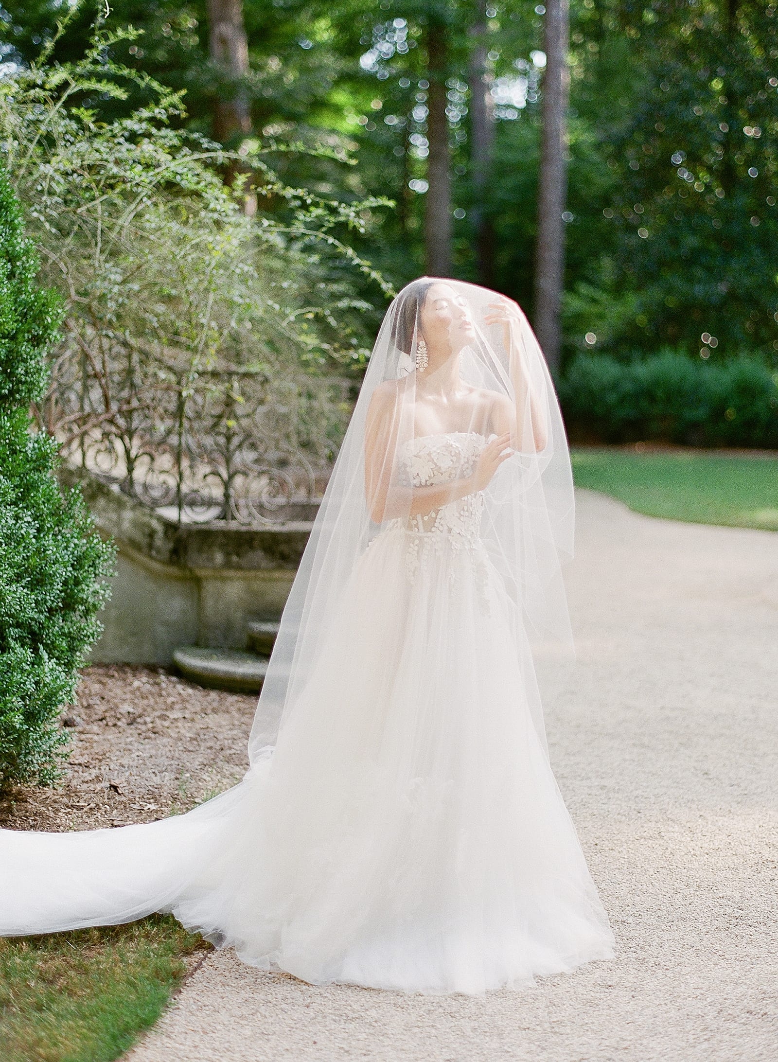 Swan House Atlanta Bride Under Veil in Sunlight Photo