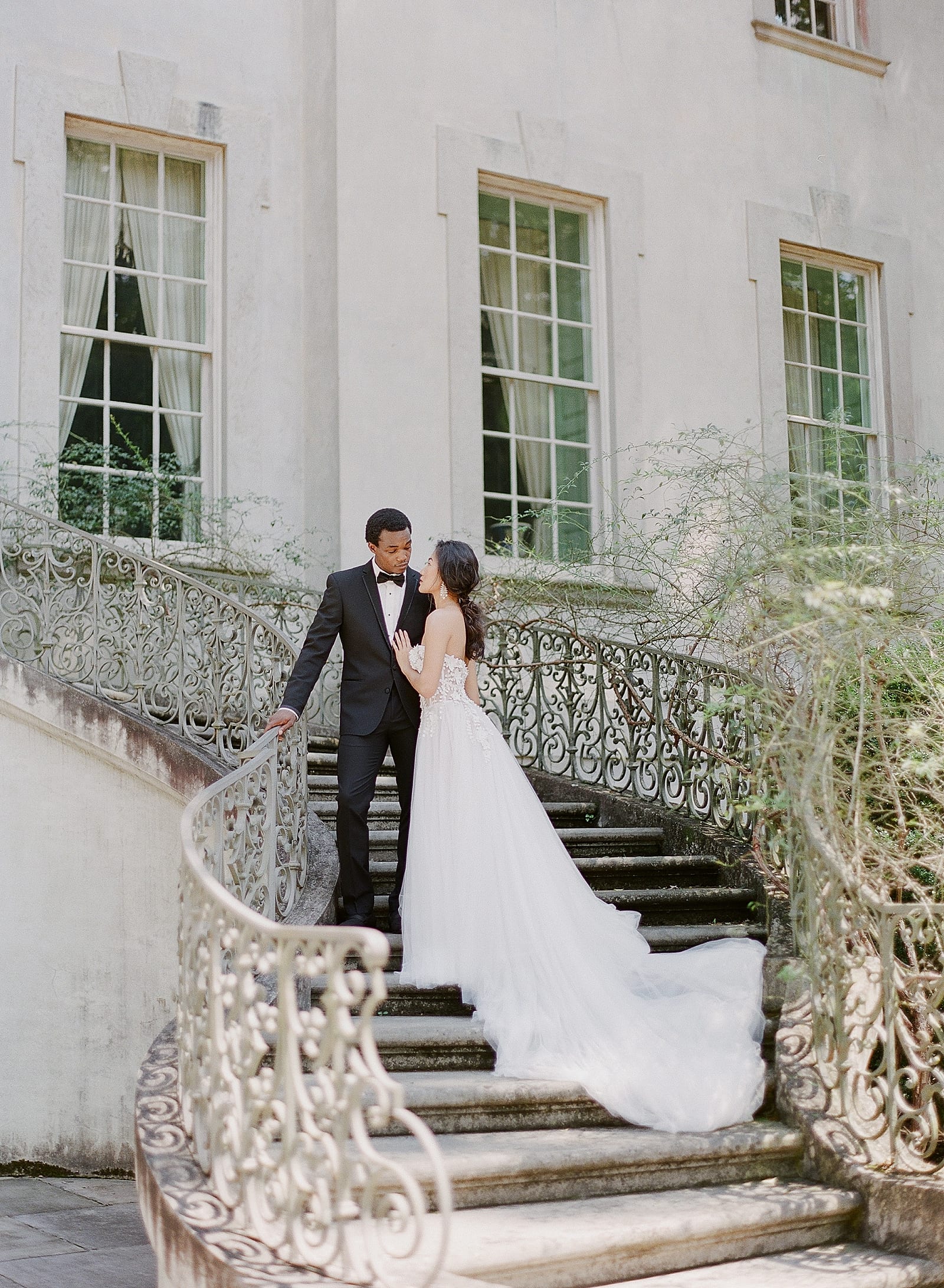 Bride and Groom on Back Steps of The Swan House In Atlanta Photo