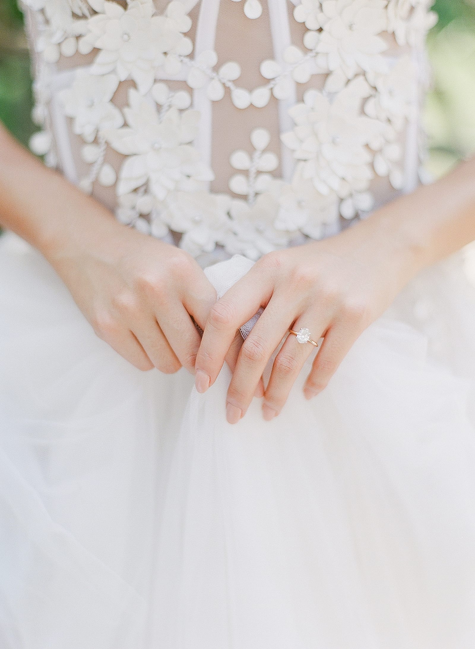 Bride Holding Dress Detail of Hands Photo