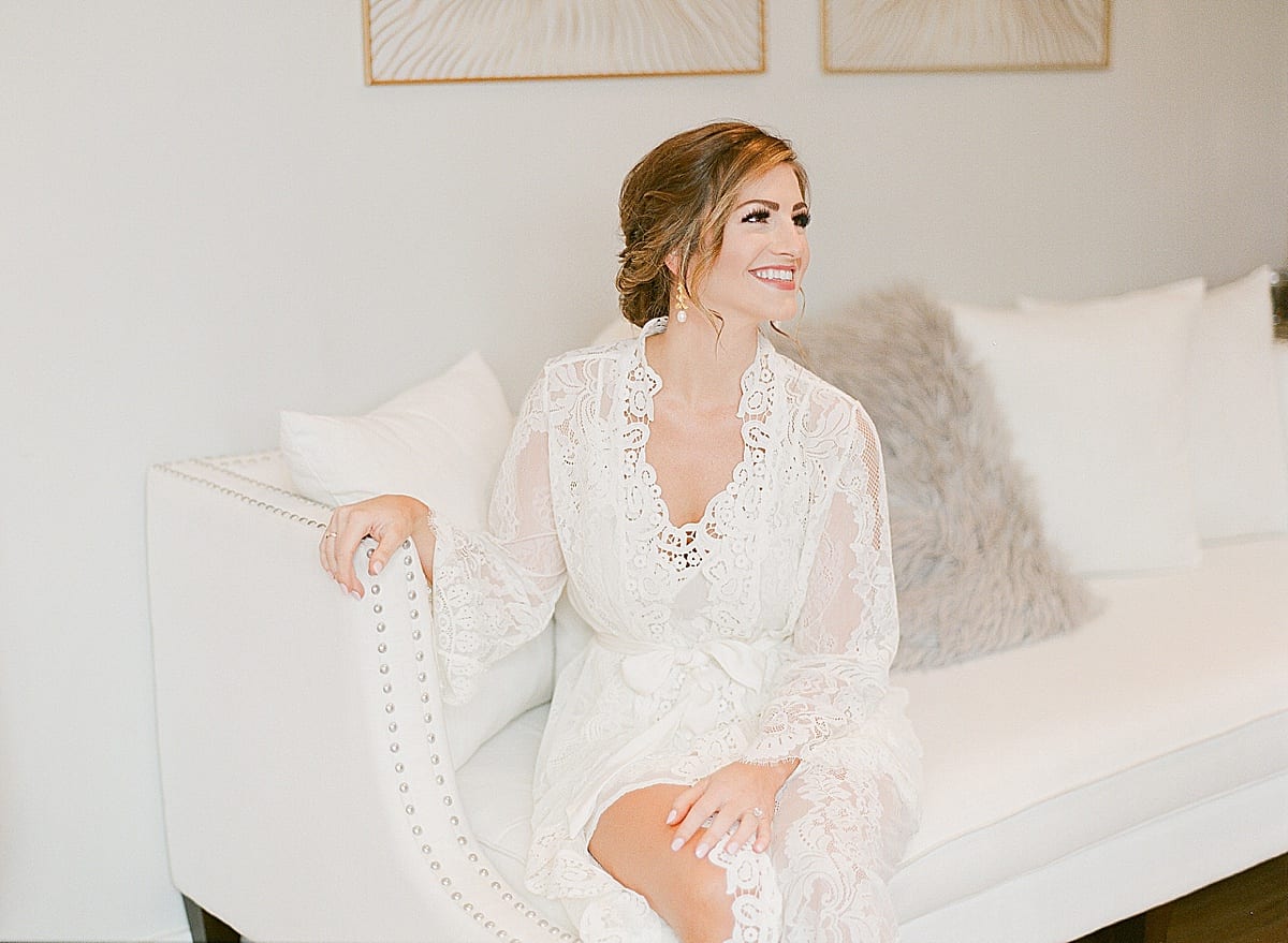 Bride in Lace Robe Getting Ready Photo