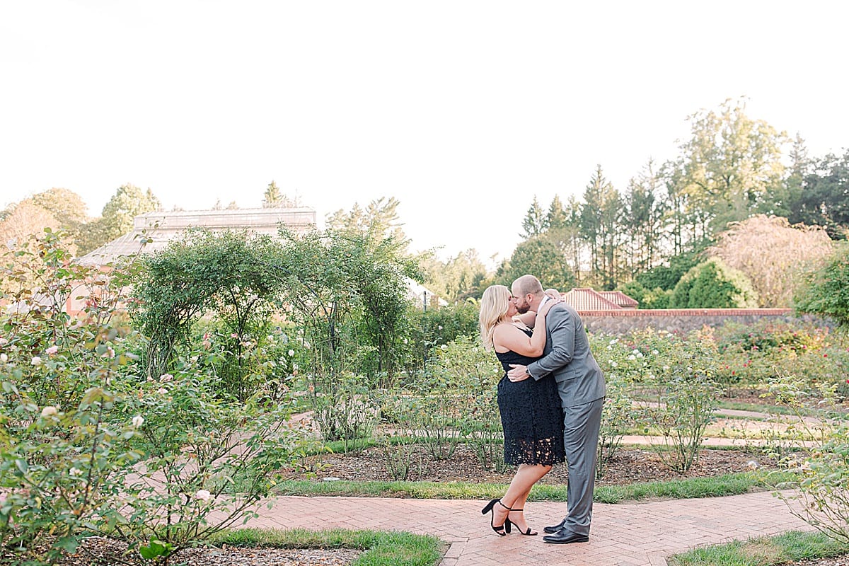 Couple Kissing in Gardens Photo