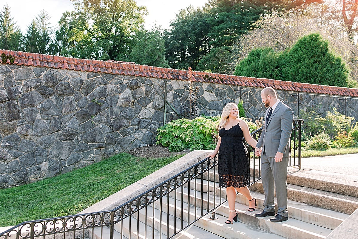 Family Session at The Biltmore Estate Couple Walking Down Stairs Photo