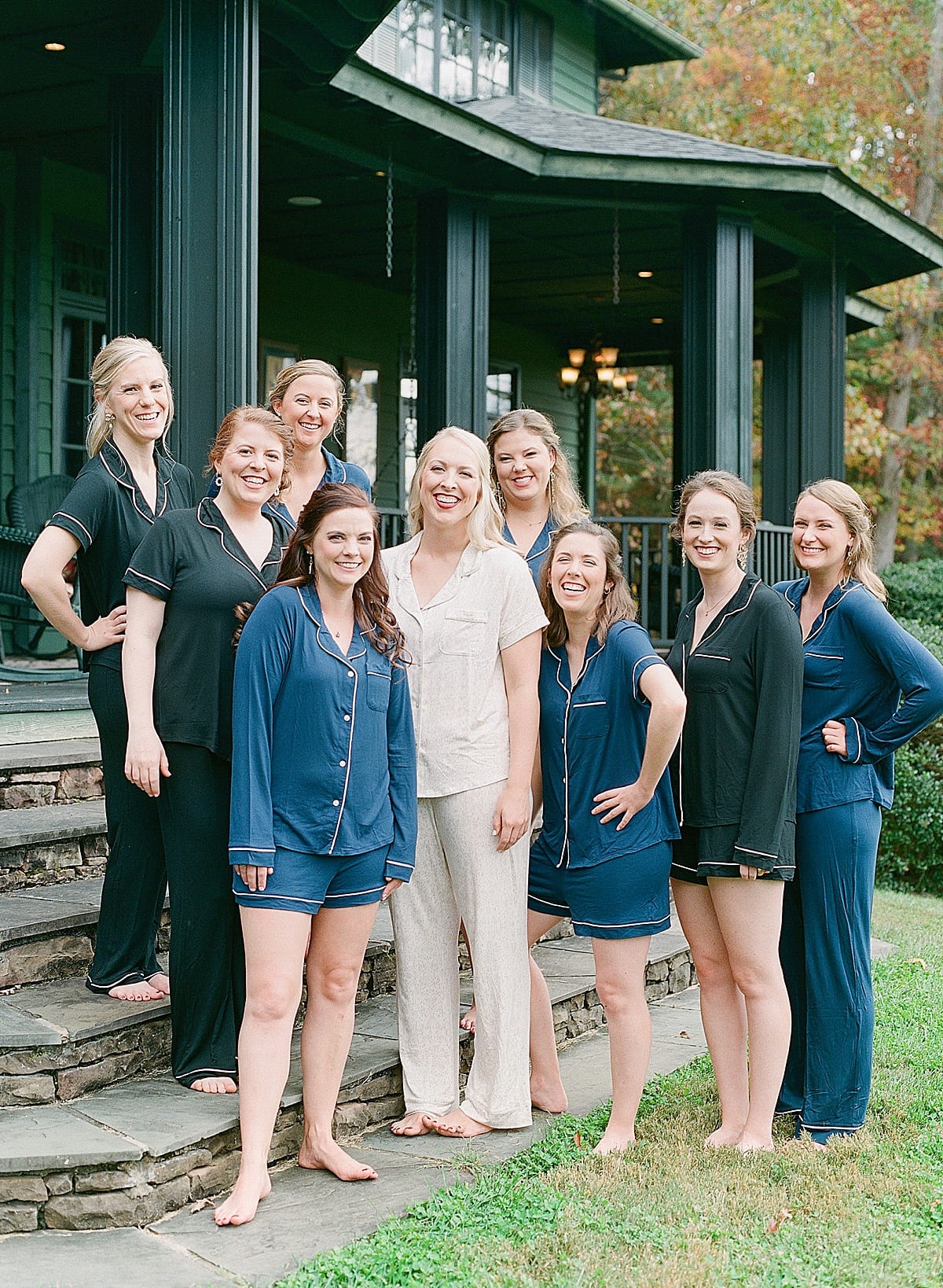 Bride with Bridesmaids in PJs on Steps Photo