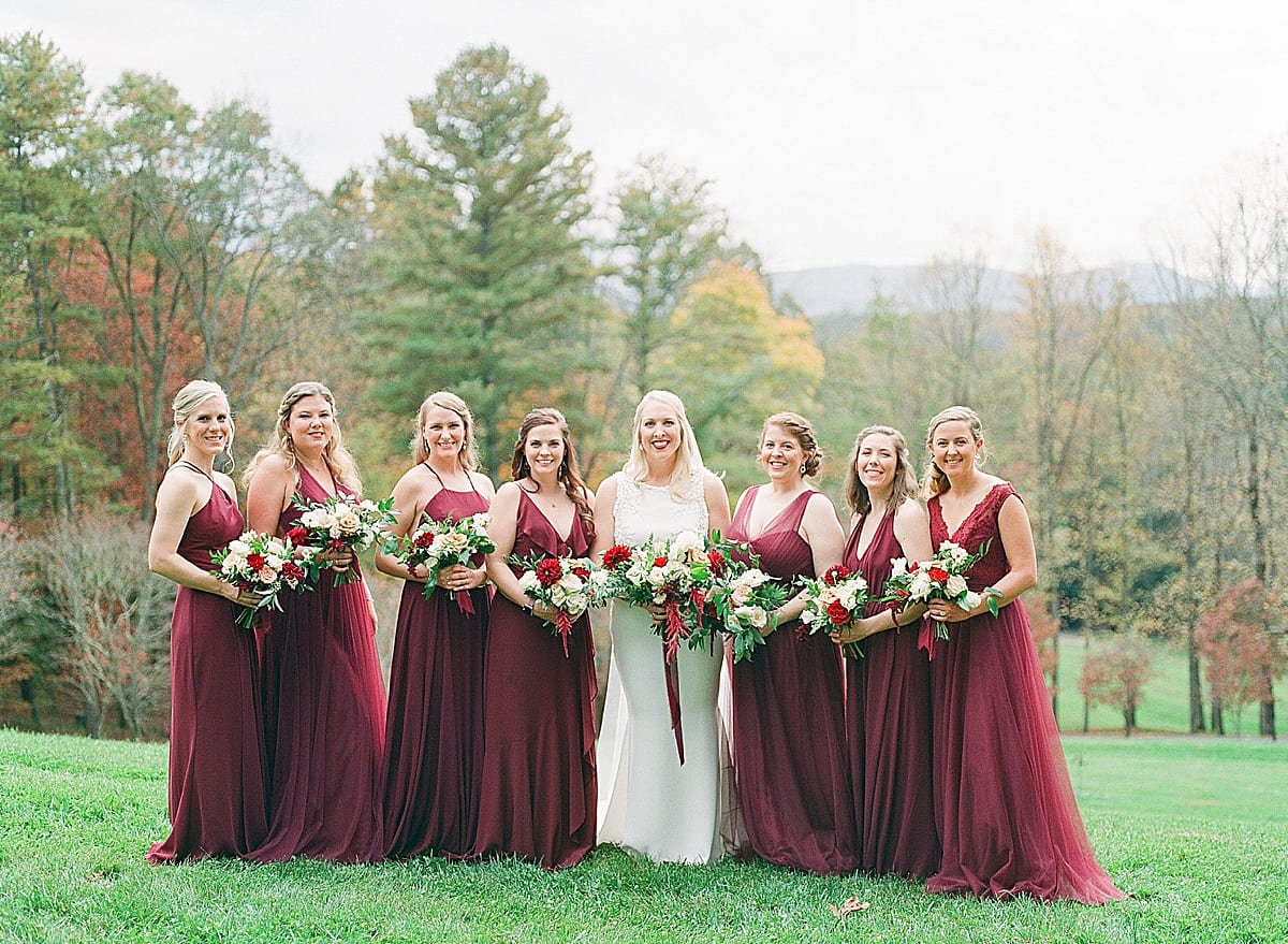 Bride with Bridesmaids Holding Bouquets Photo