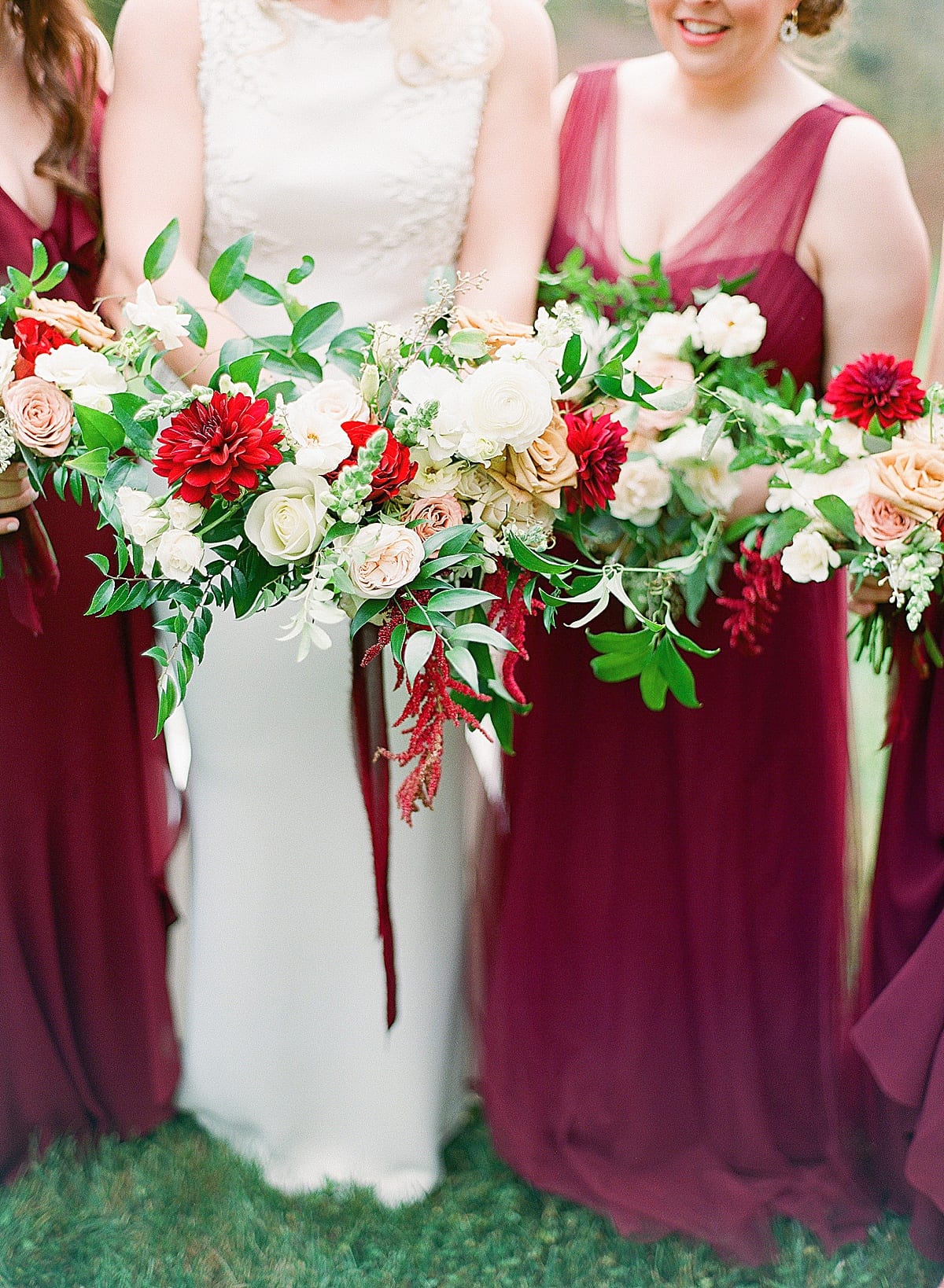 Detail of Bride and Bridesmaids Holding Bouquets Photo