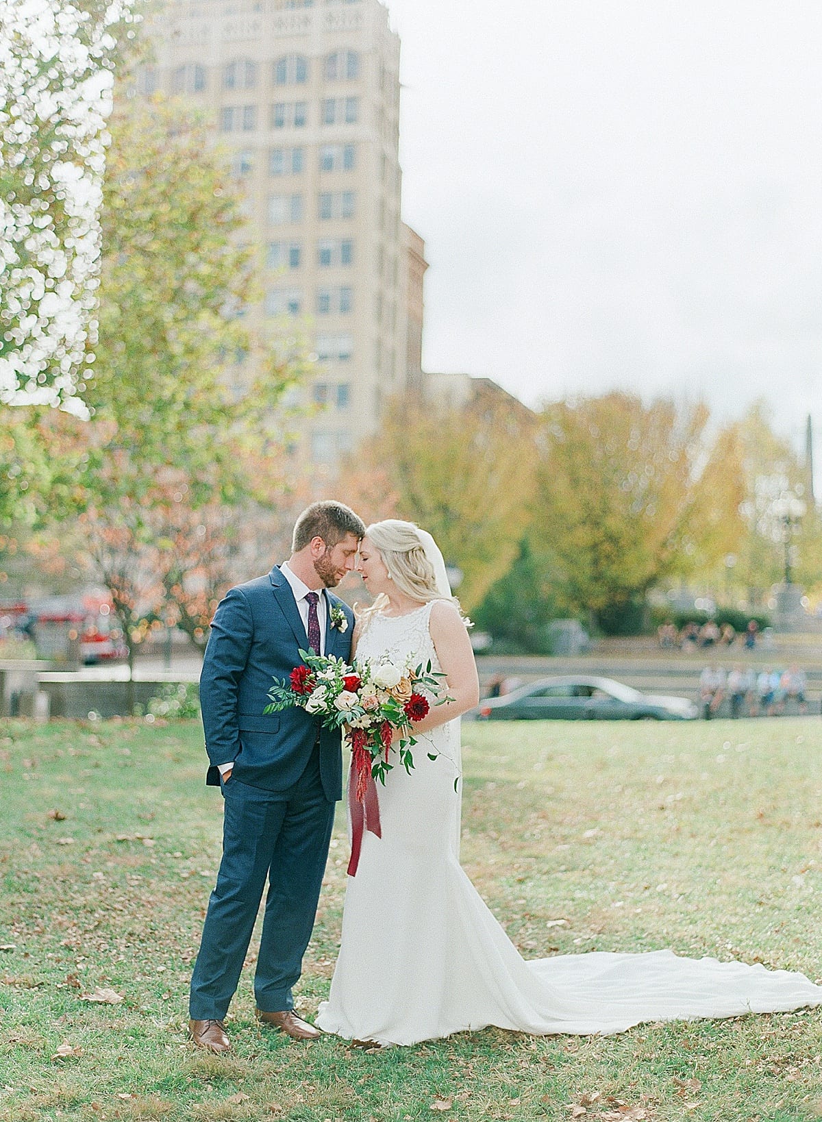 Bride and Groom Nose to Nose in Park in Downtown Asheville Photo