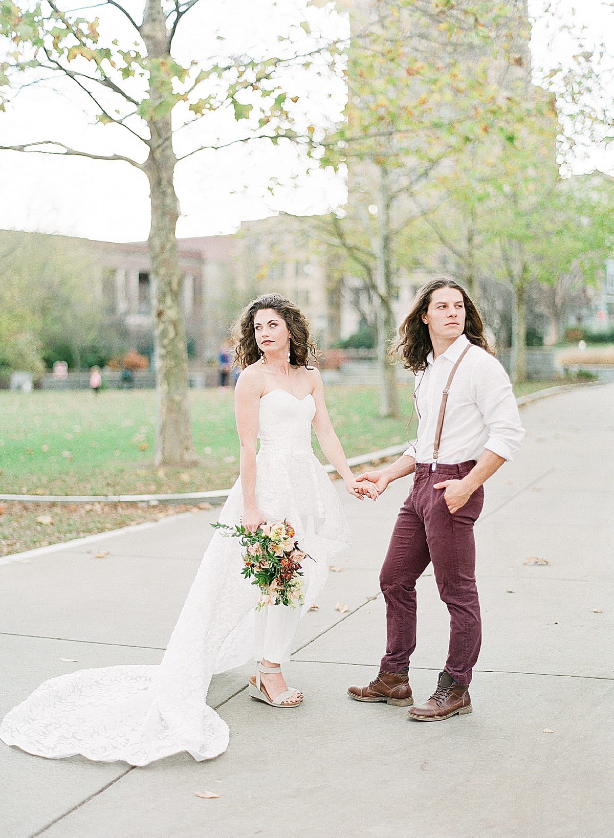 Asheville Elopement Bride and Groom Holding Hands In Park Photo