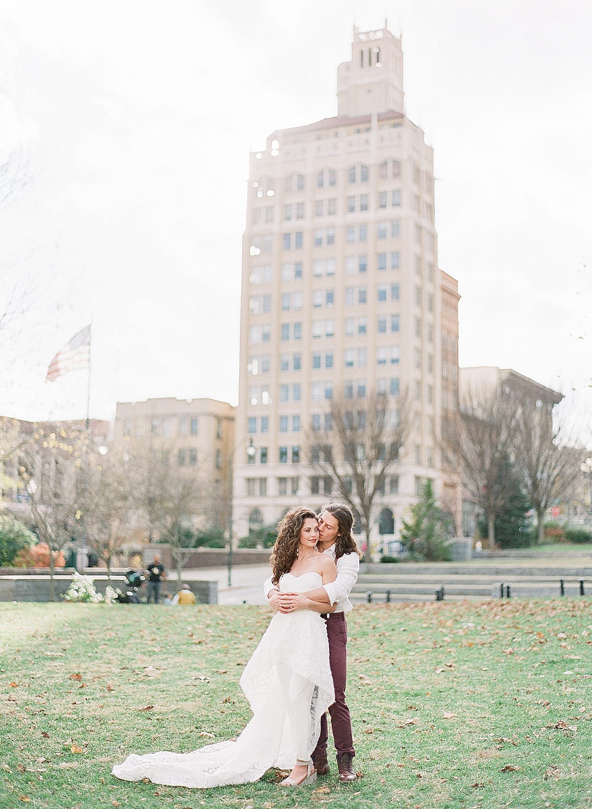 Asheville Elopement Bride and Groom Snuggling in Park Photo