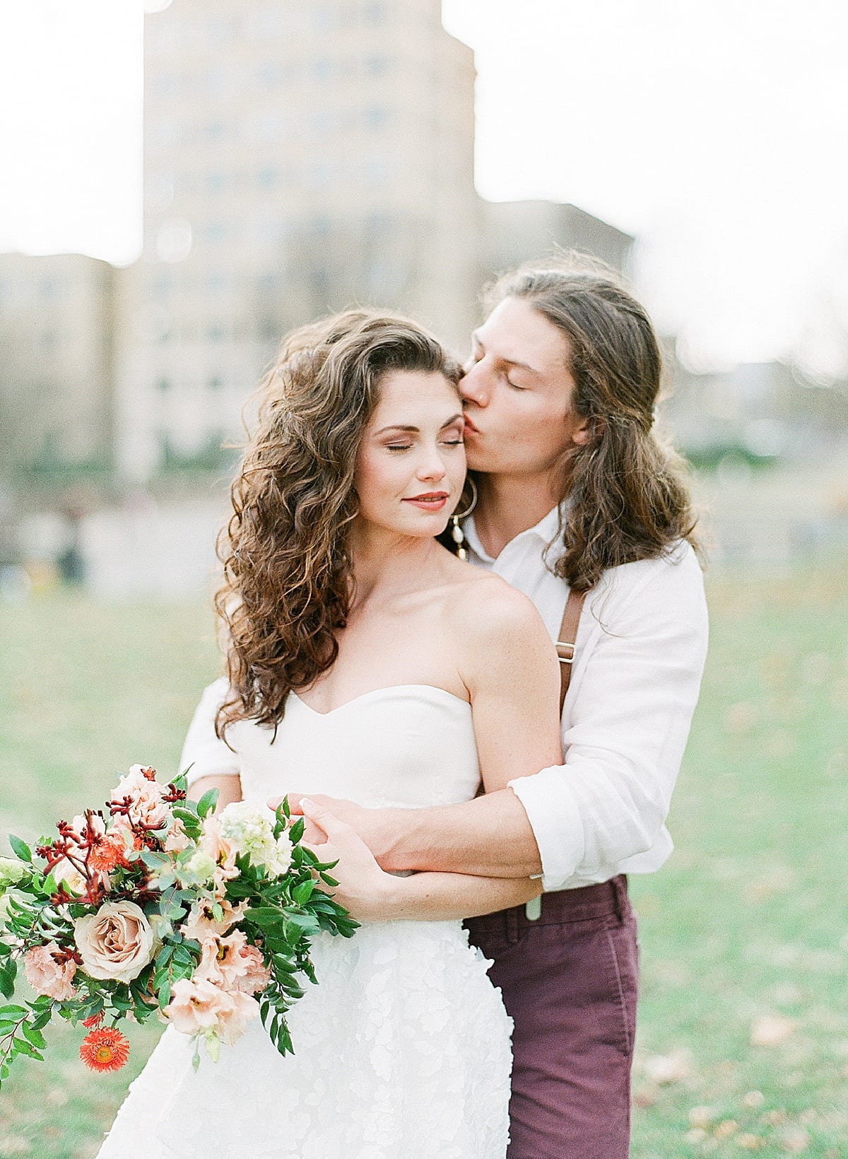 Asheville Elopement Groom Kissing Bride in Park Photo