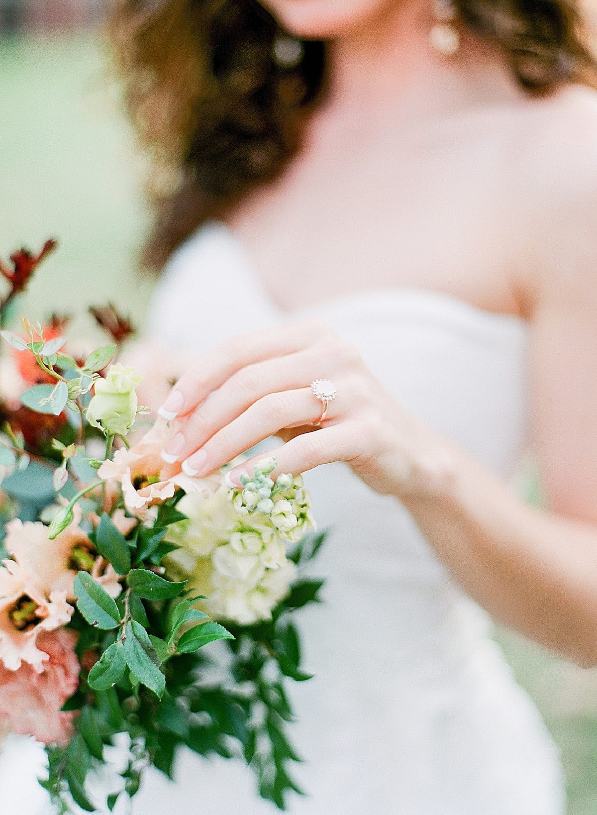 Brides Hand in Flowers Photo