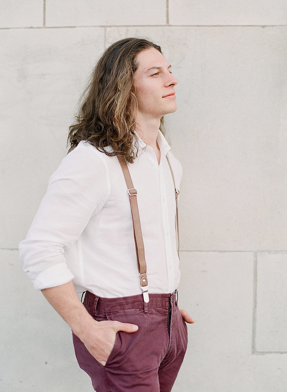 Asheville Elopement Groom in Suspenders Looking Off Photo