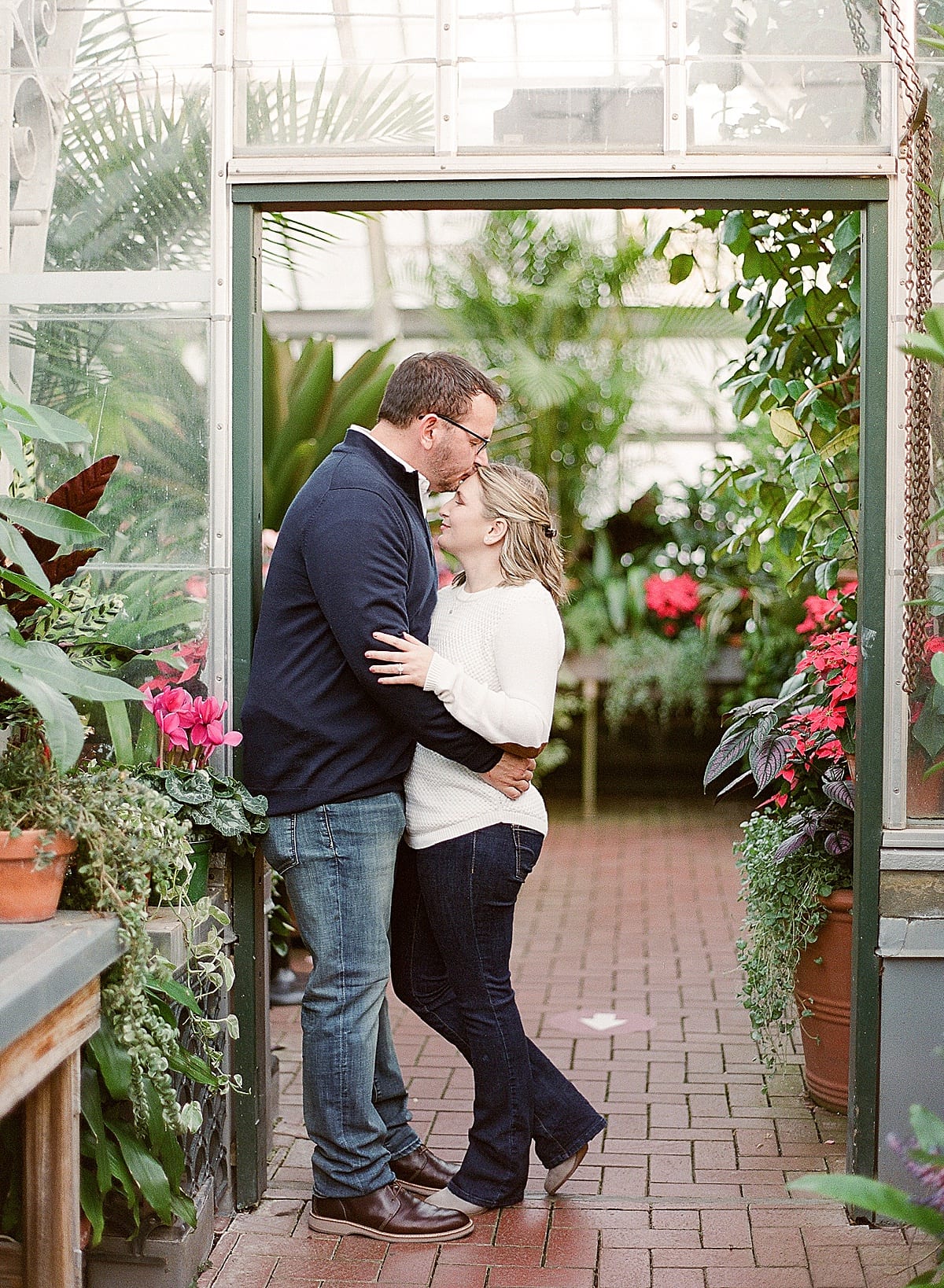 Couple Kissing in Doorway at Biltmore Conservatory Photo