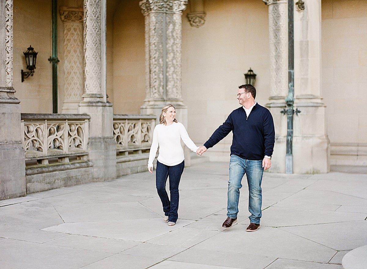 Couple Holding Hands Walking Toward Camera Photo