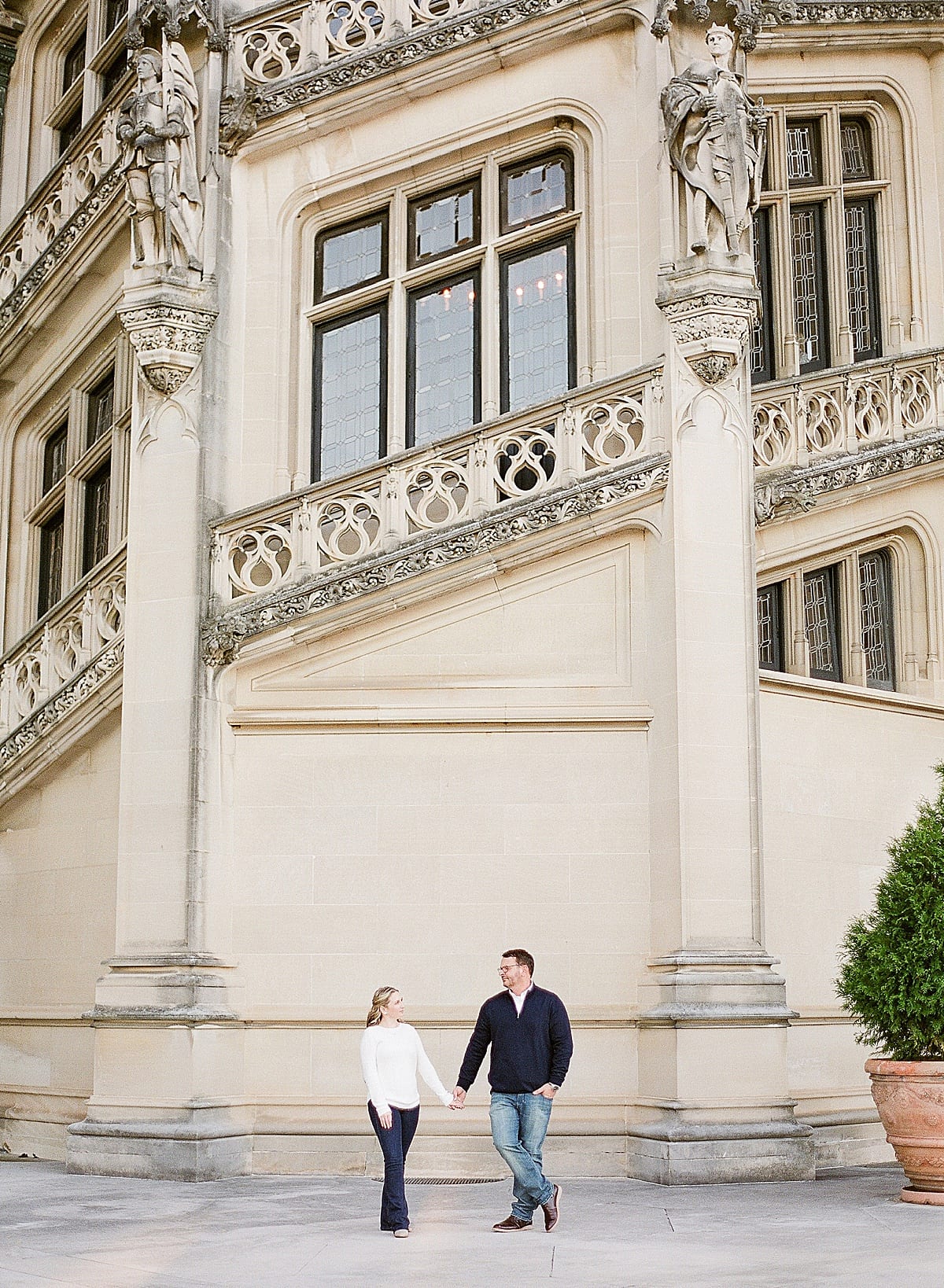 Couple Holding Hands Looking at Each Other at Biltmore Estate Photo