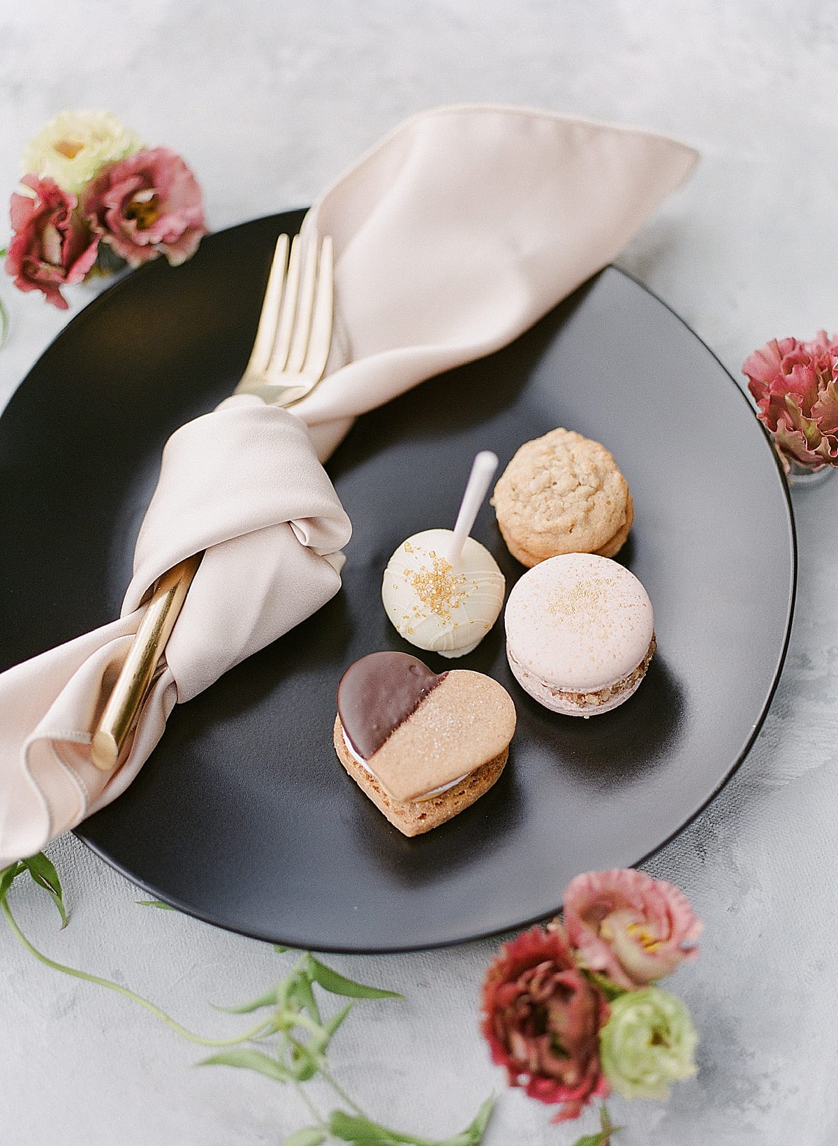Cookies and Macaroons on Black Plate Detail for Bridal Shower Photo