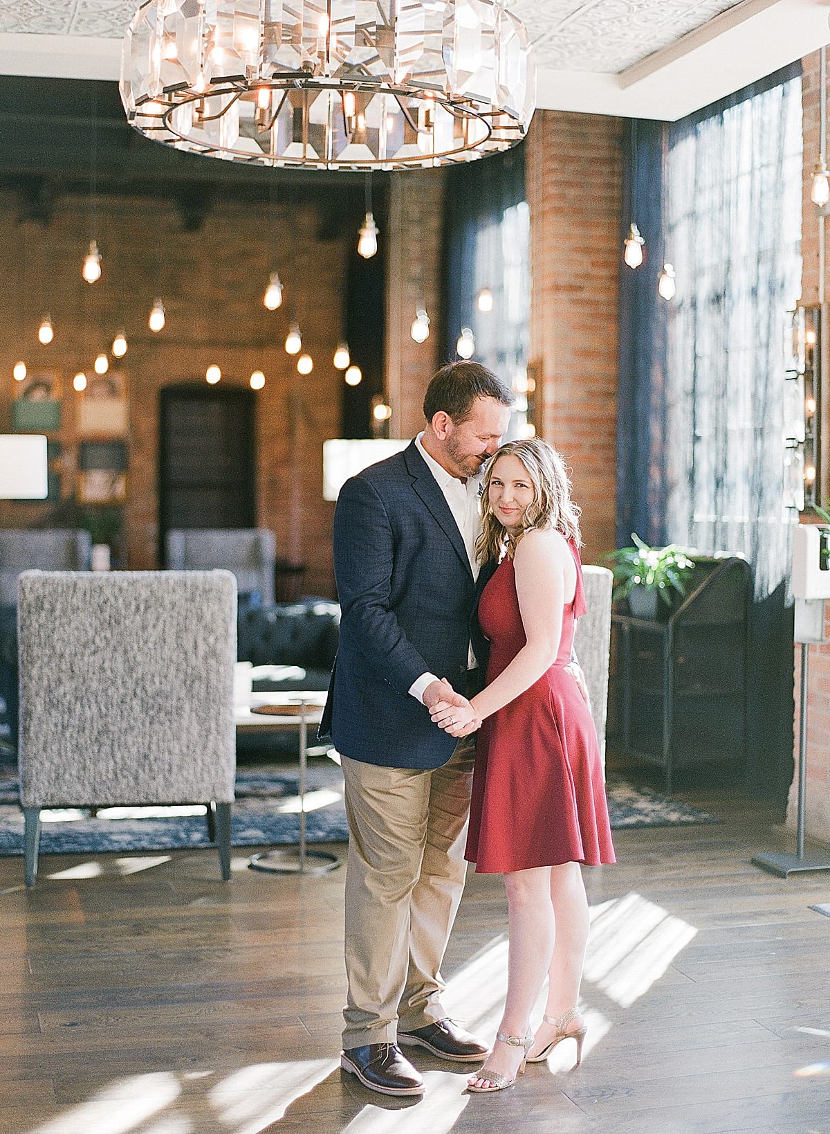 Couple Holding Hands at Downtown Asheville Hotel The Foundry Photo