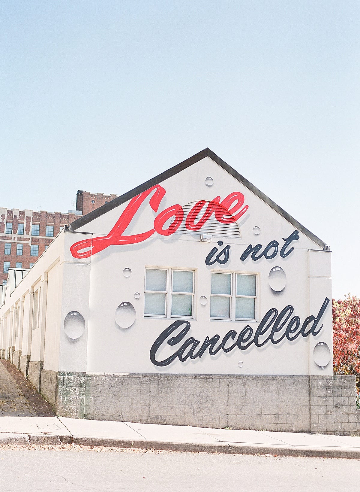 Love Is Not Cancelled Mural on Spicer Greene Jeweler in Asheville North Carolina Photo