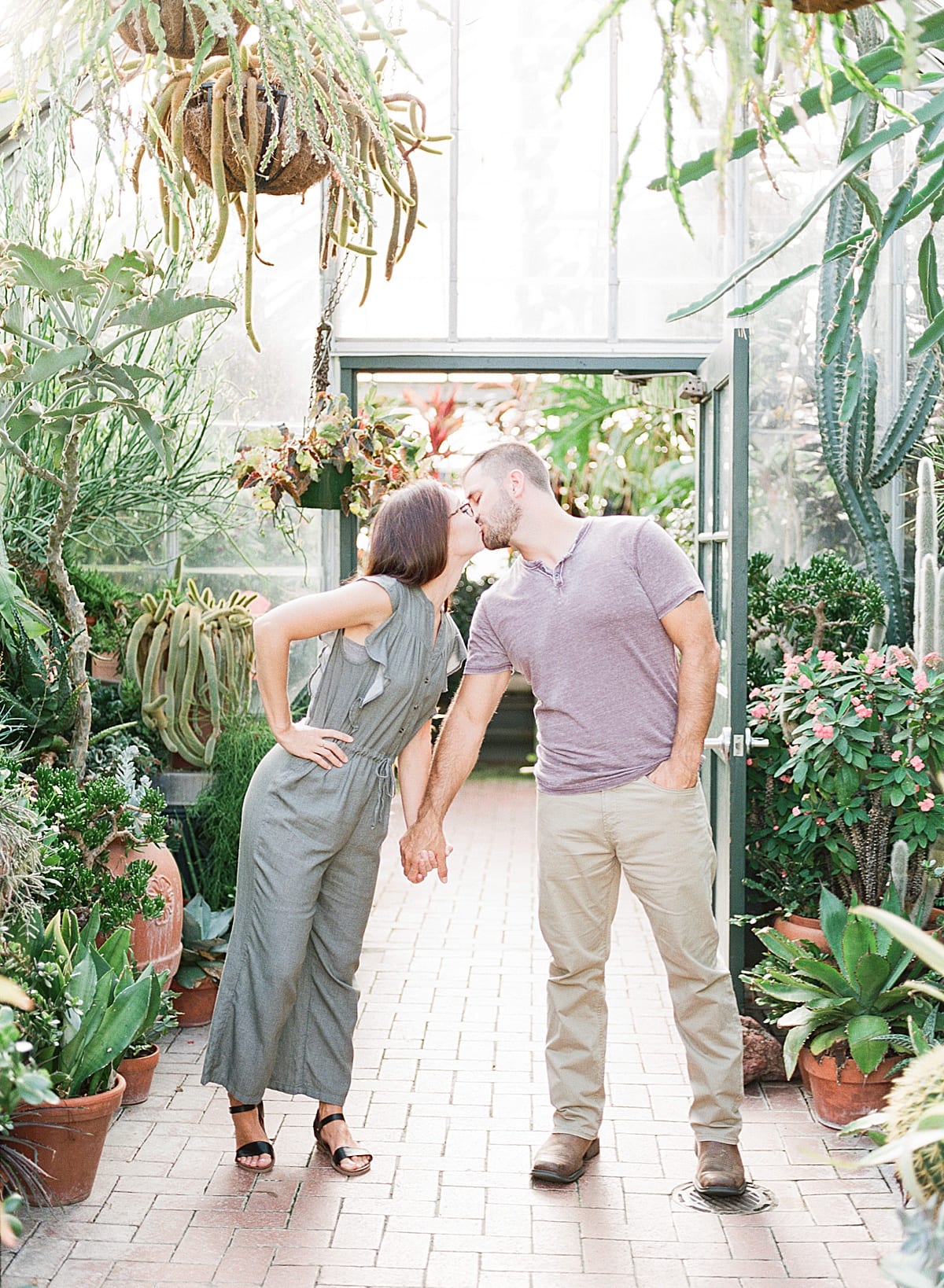 Couple in Biltmore Conservatory Kissing Photo