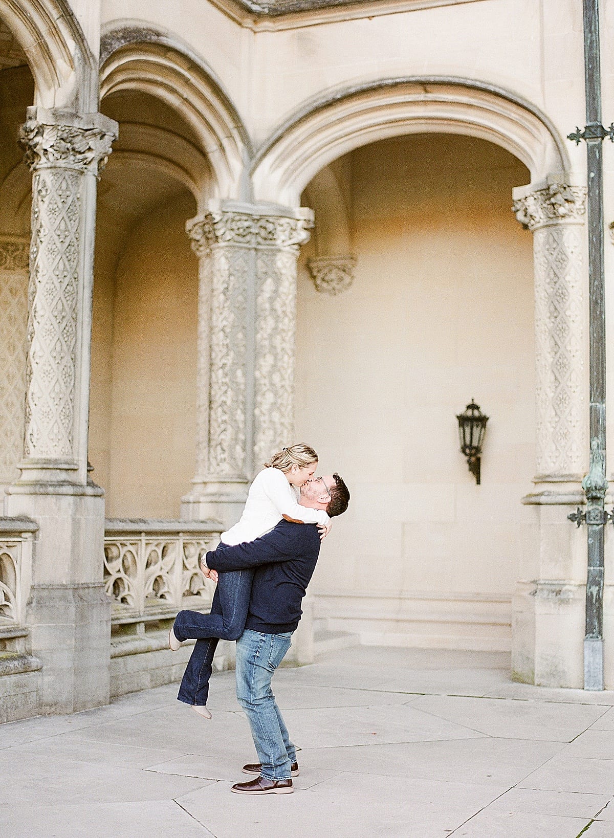 Couple Kissing at Biltmore Engagement Session Outfit Inspiration Photo