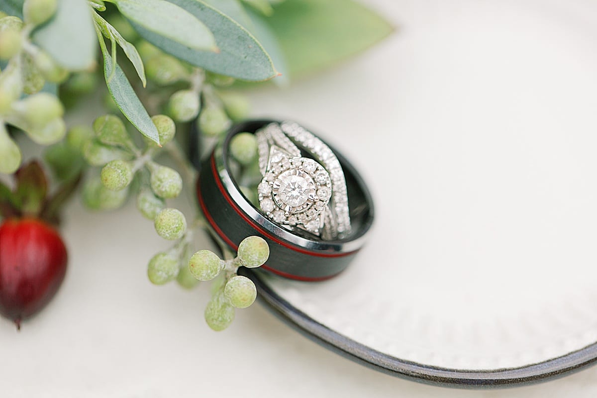 Wedding Rings on a dish with Flowers Photo