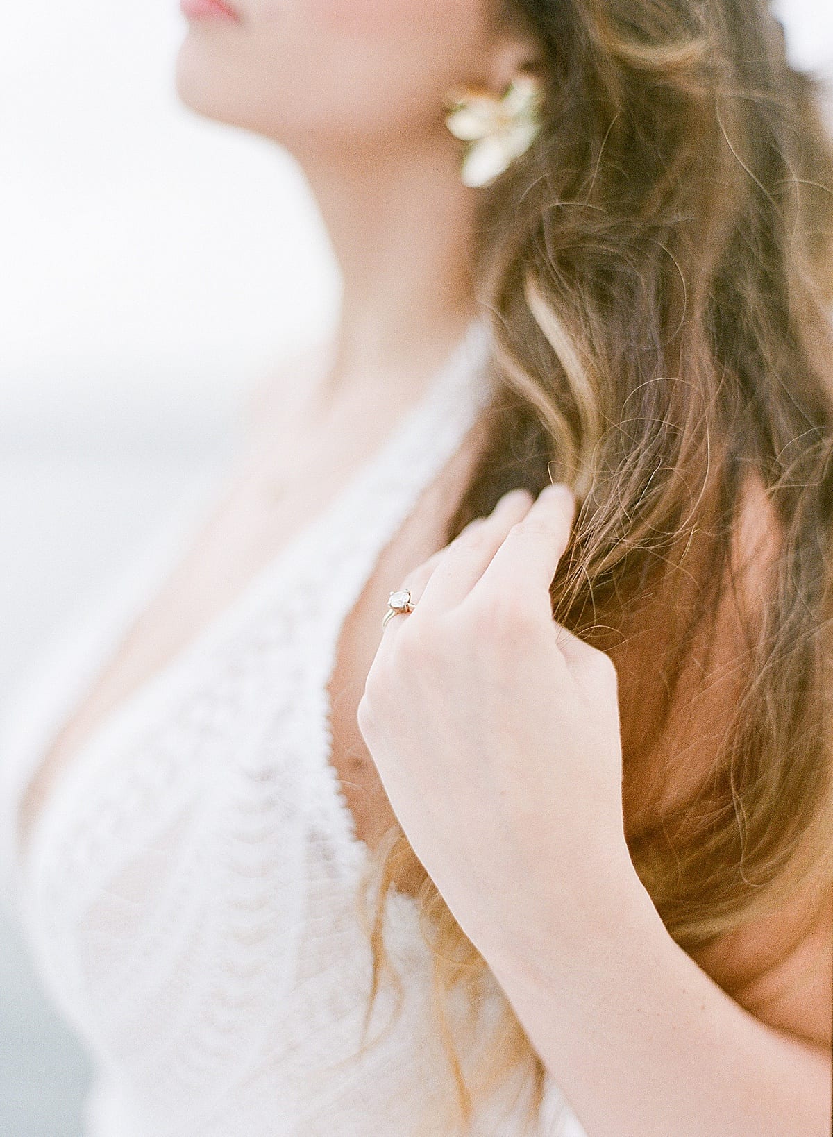 Detail of Brides Hands in Her Hair Photo
