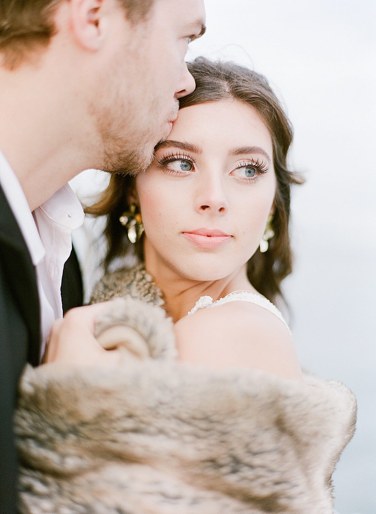 Hilton Head South Carolina Sailboat Wedding Groom Kissing Bride on Forehead Photo