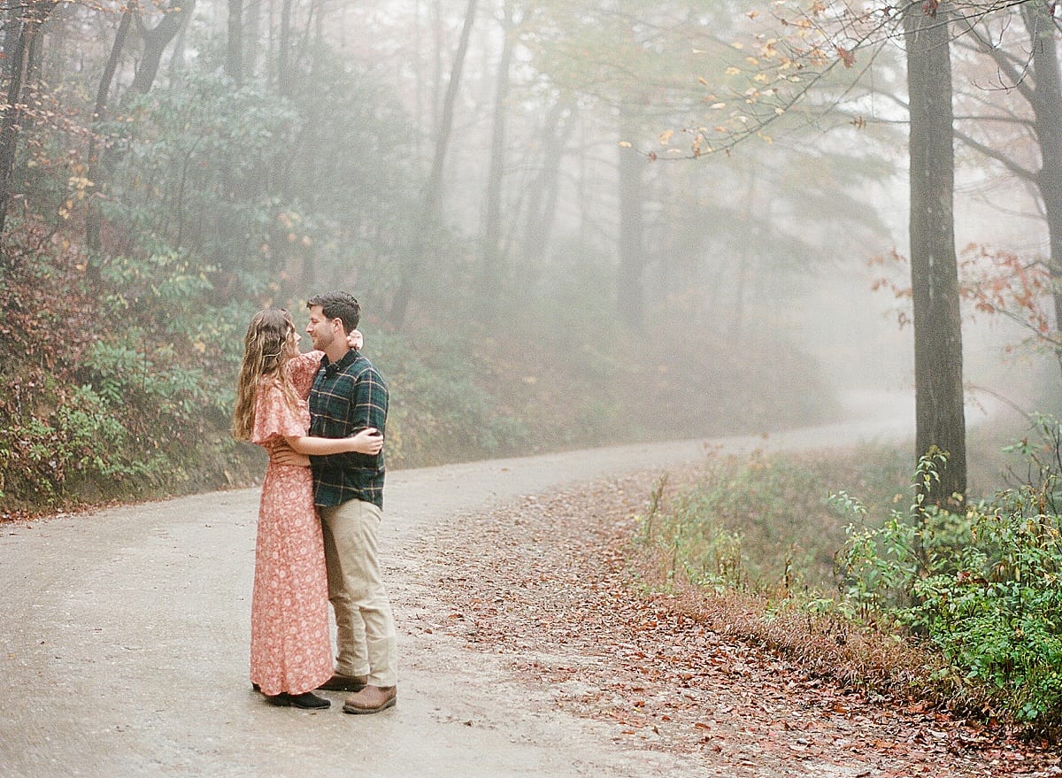 Couple Hugging on Road in Linville Gorge Photo
