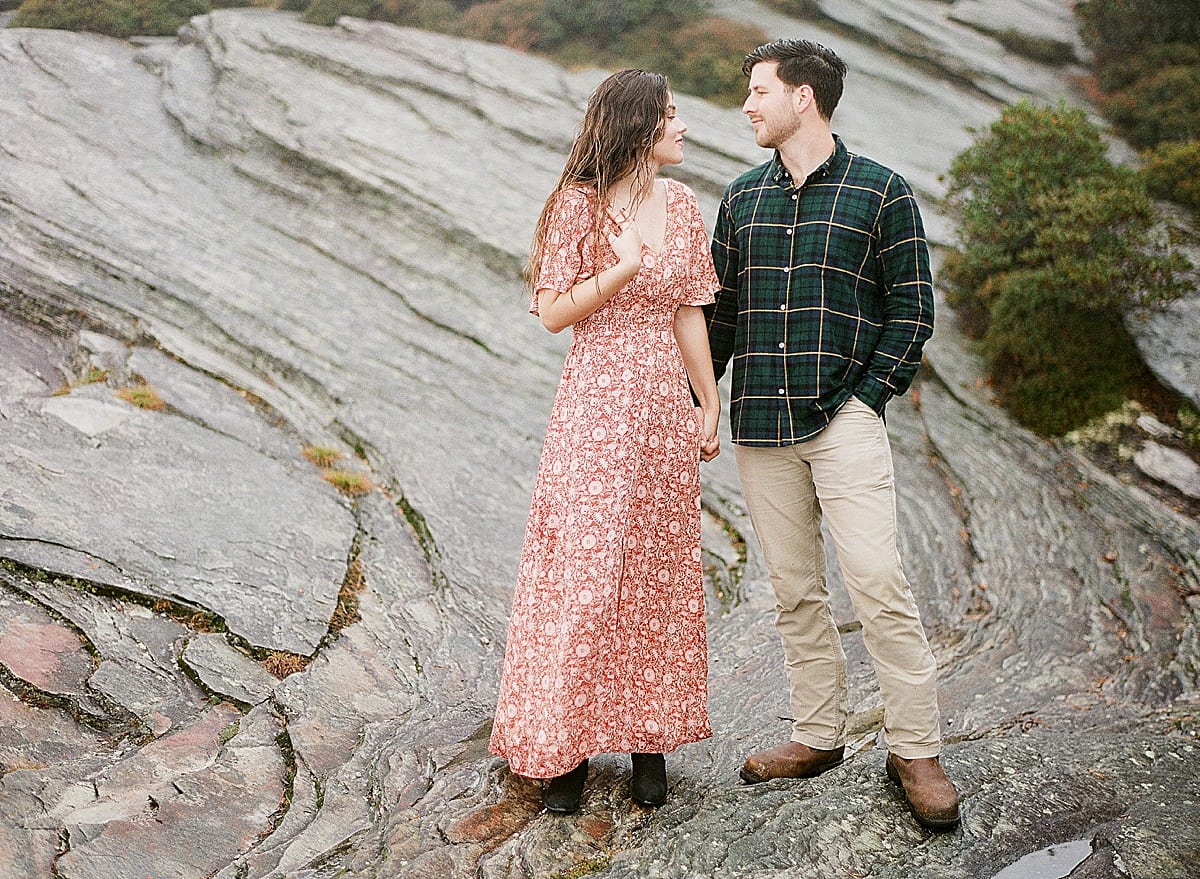 Couple Smiling at Each other on Rocks in Linville Gorge Photo