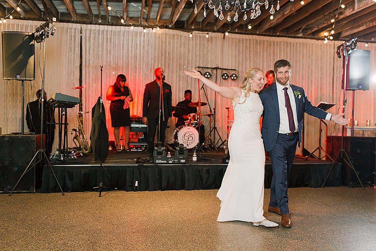 Bride and Groom First Dance in Front of Band Photo