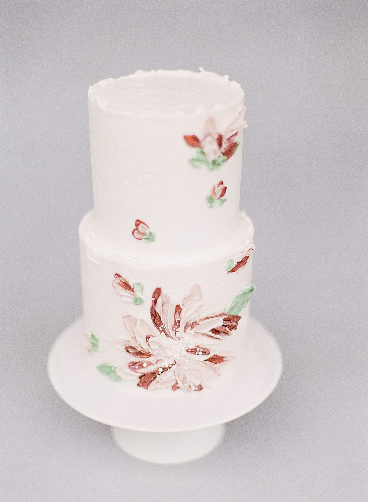 Palette Painted Wedding Cake with Pink and Red Flowers Photo