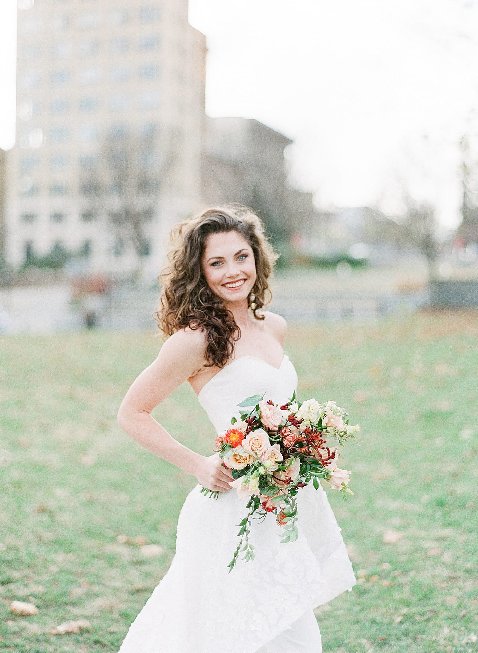 Asheville Elopement Bride Smiling Holding Bouquet In Park Photo
