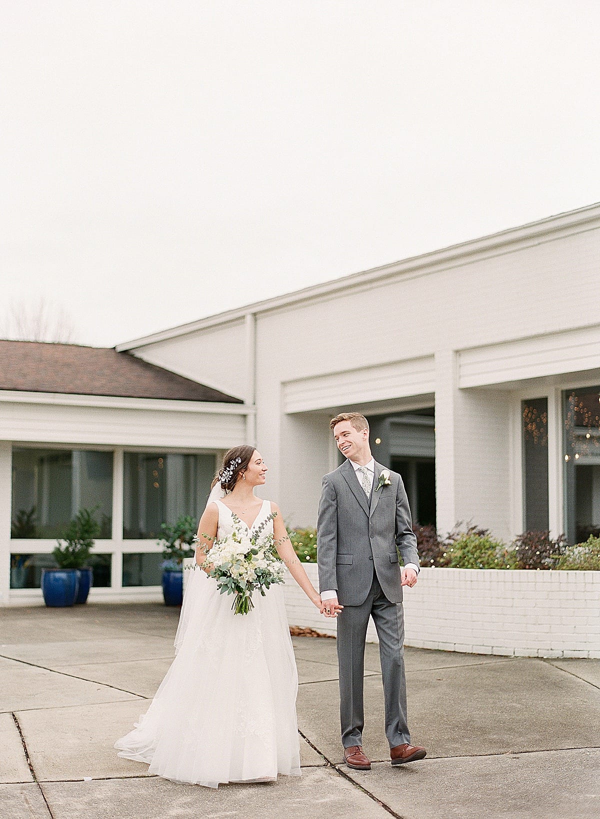 Charlotte Wedding Photographer Bride and Groom Holding Hands Photo