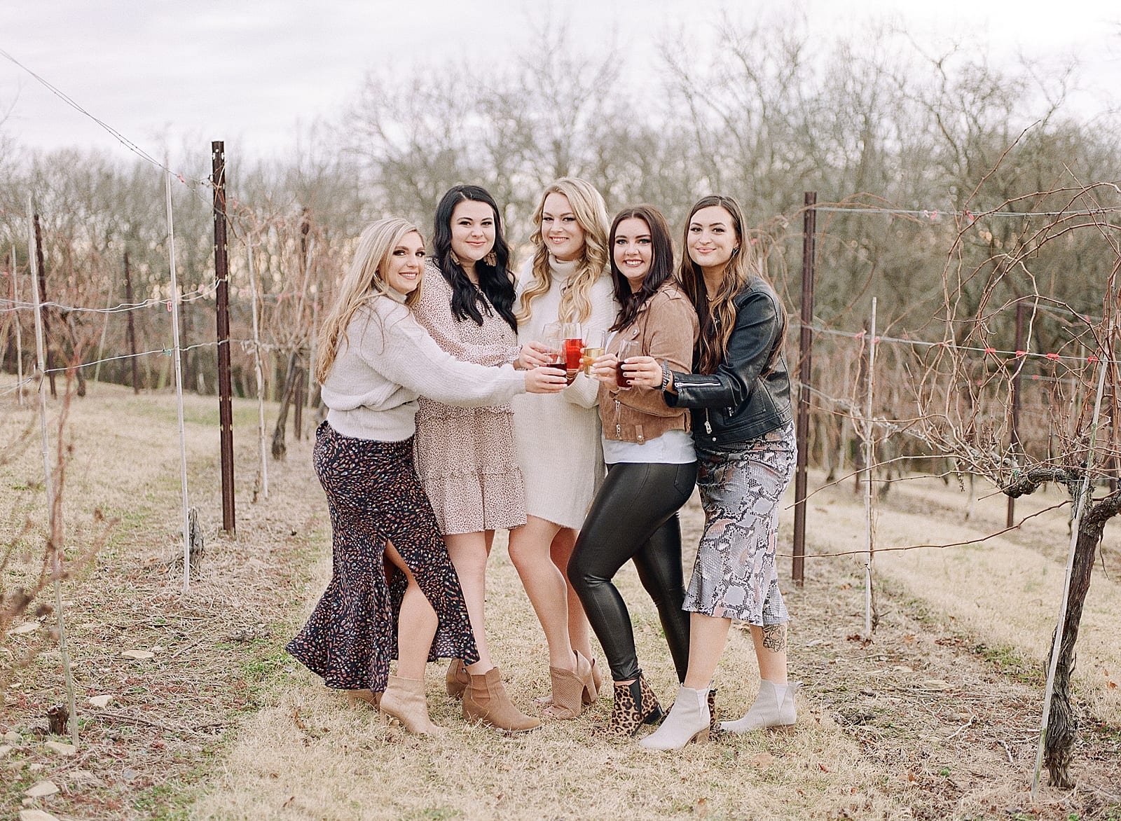 Bride to be with bridesmaids at winery photo