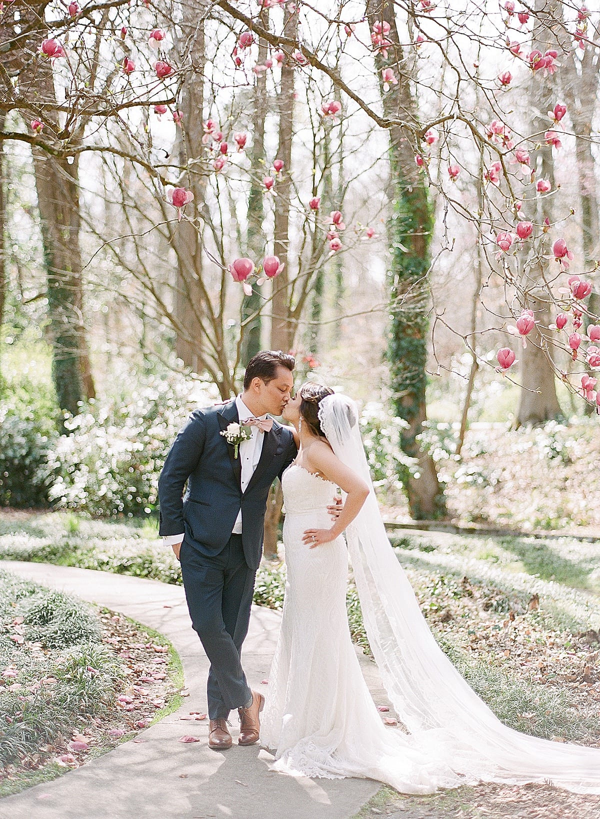 Cator Woolford Gardens Bride and Groom Kissing in Garden Photo