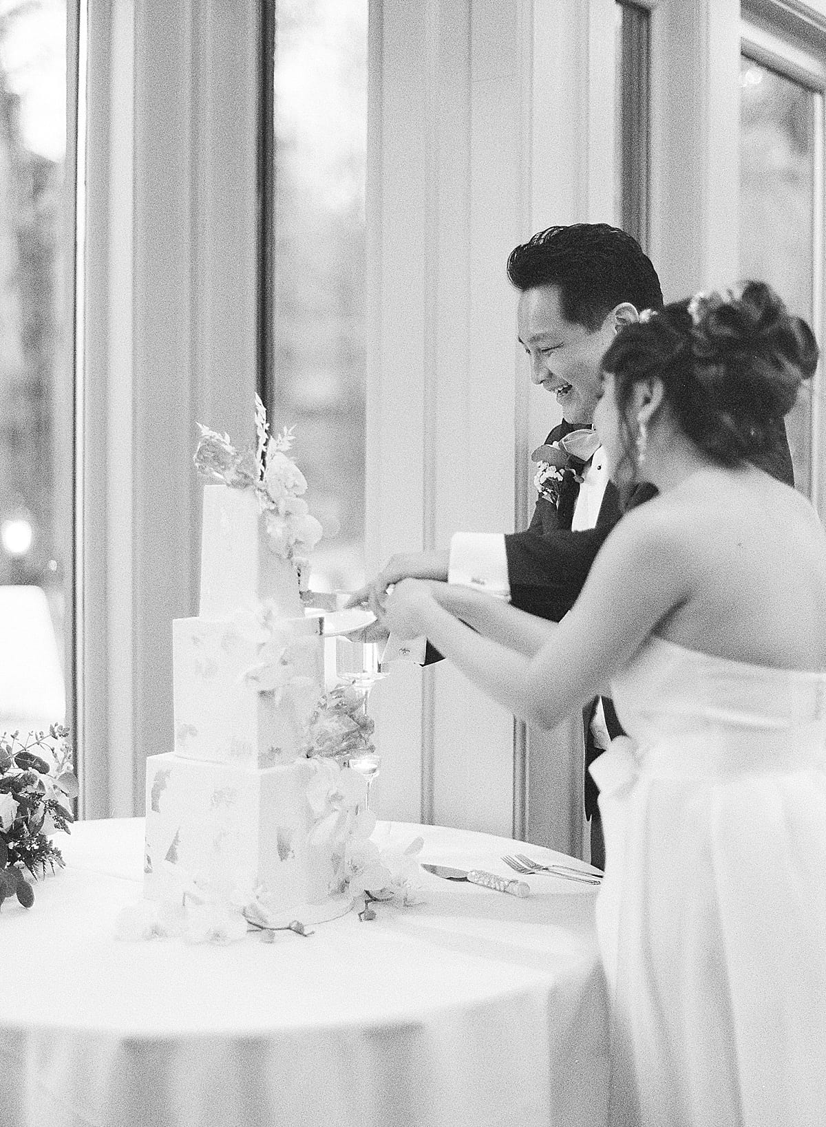 Country Club Of The South Black and White of Couple Cutting Cake Photo