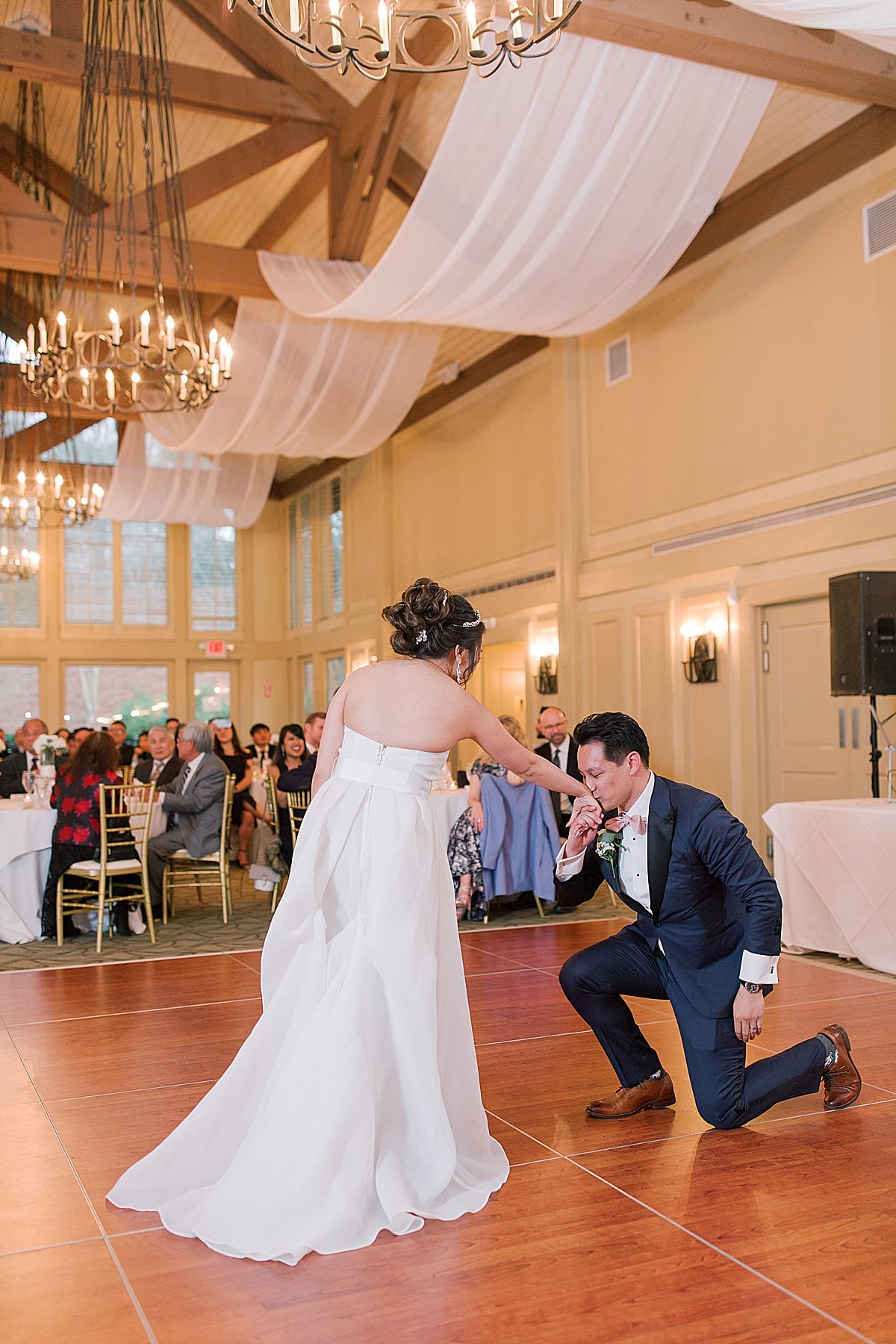 Country Club Of The South Bride and Groom First Dance Groom Kissing Brides Hand Photo
