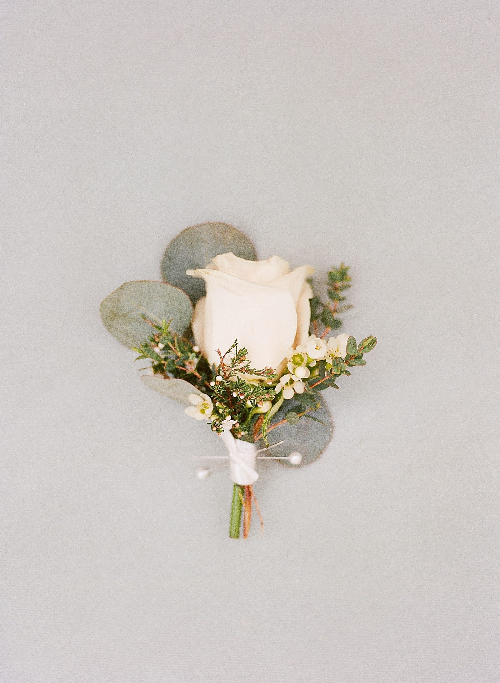 boutonniere with white flower photo