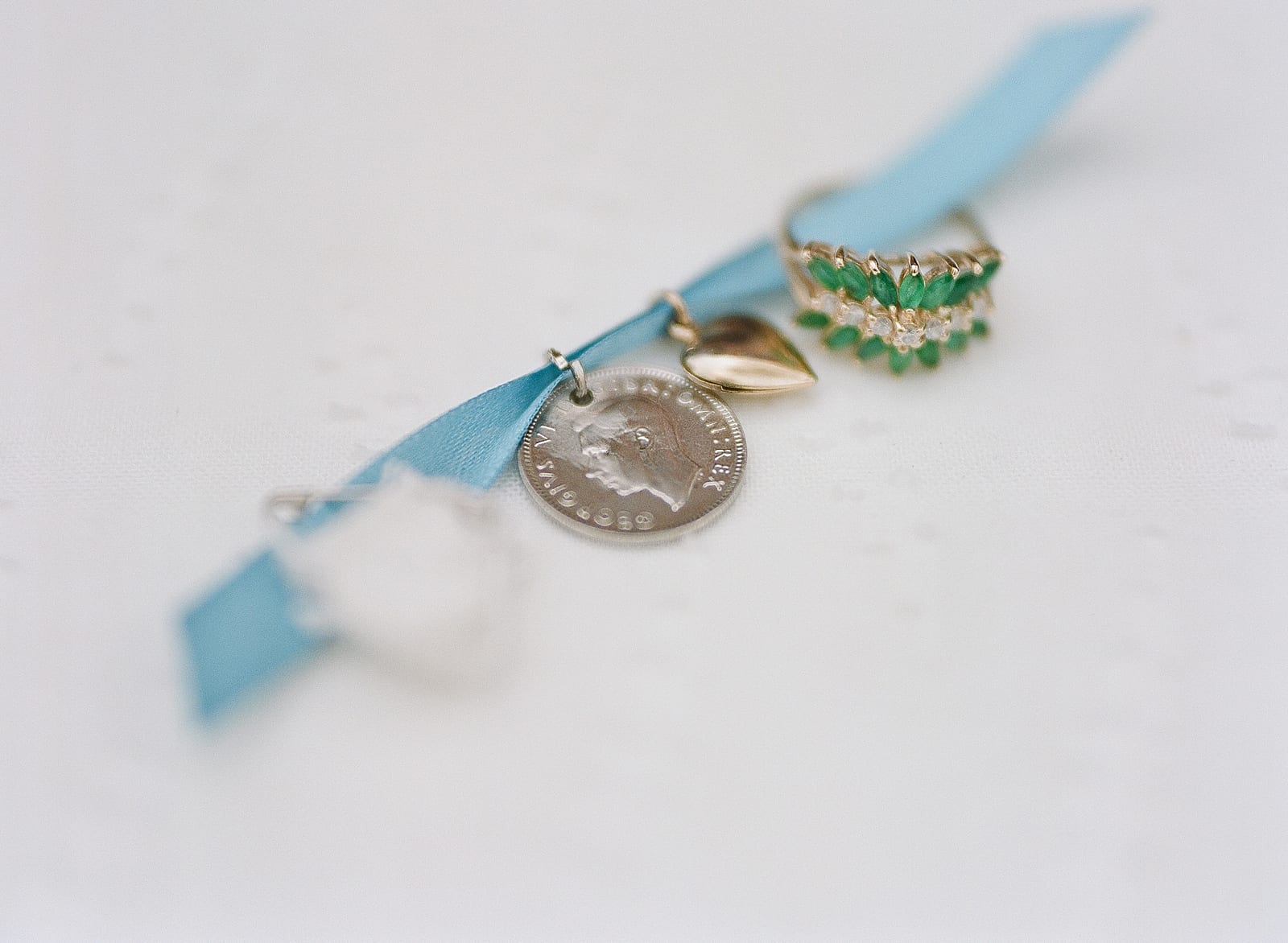 six pence charm and ring on ribbon photo